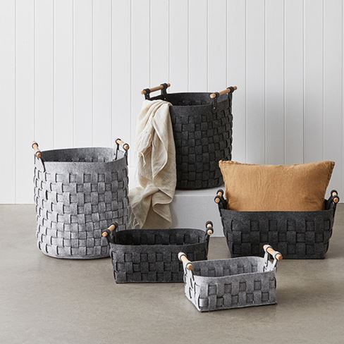 various small storage baskets in grey tones