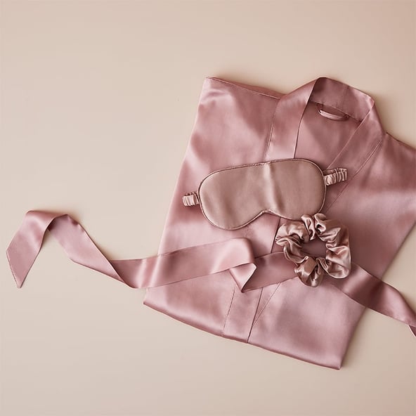 mothers day pyjamas in silk pink with matching eye shades.