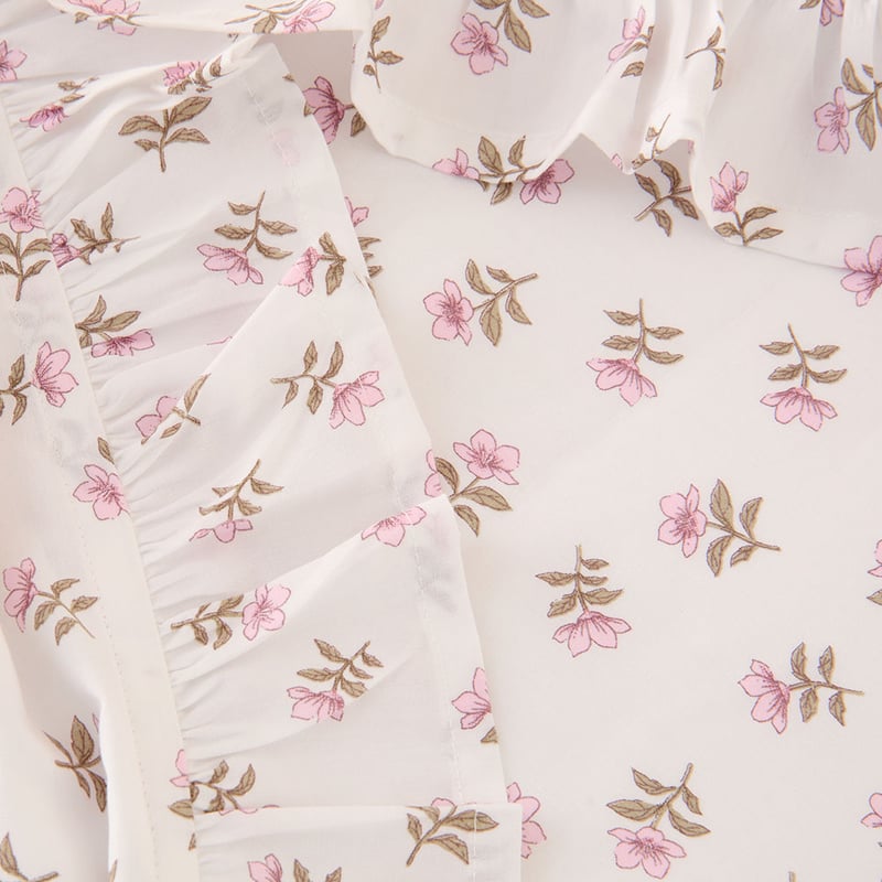 Fleur Harris Dancing Flowers White Ruffle Cot Sheet Set