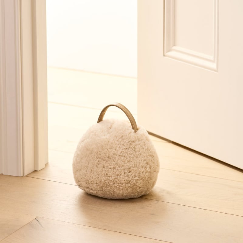 Furry White Door Stop