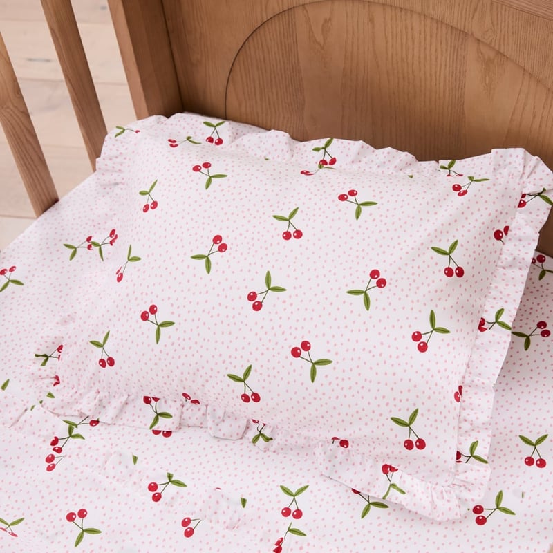 Cherry White Ruffle Cot Sheet Set