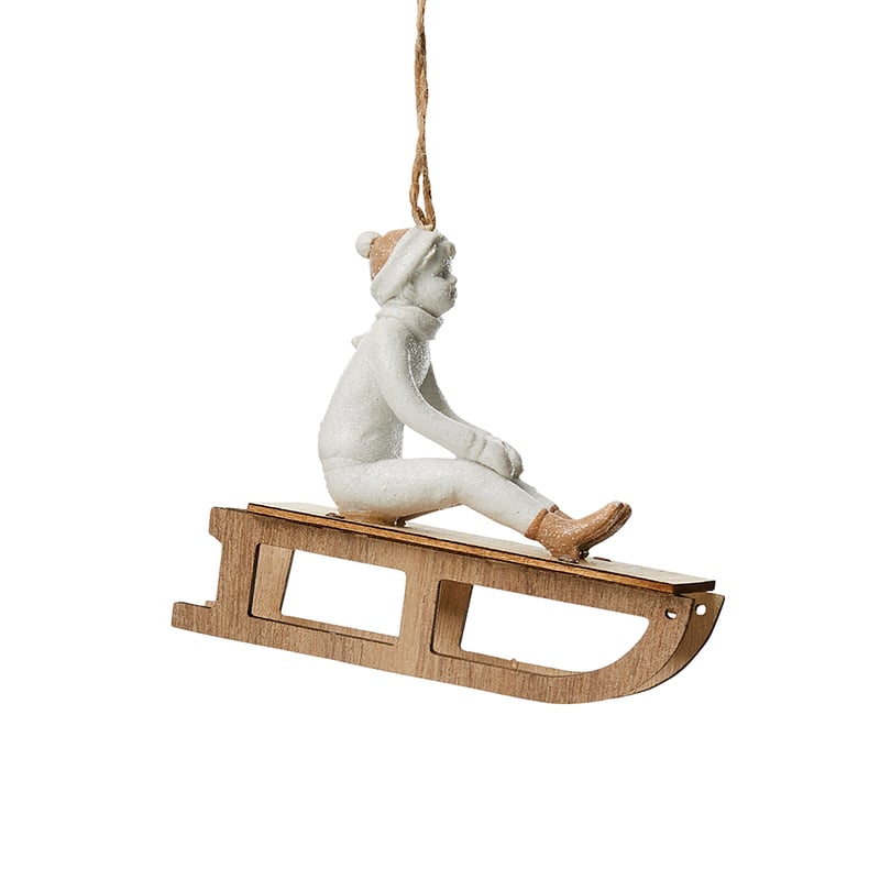 Resin Girl Ornament On Sledge White