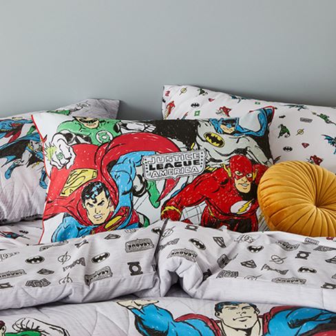 Justice League printed Standard Pillowcase in the centre of a kid’s bed styled with matching bedlinen. 