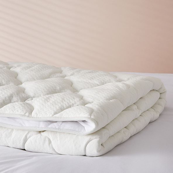 Adairs Kids Rich Bamboo Quilt, a luxuriously thick padded quilt that looks dreamy.