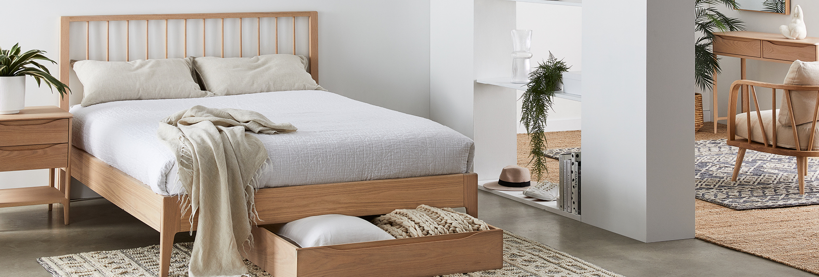 bedroom with bed in white sheets and pillow