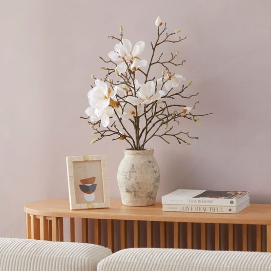White Magnolia in Ceramic Vase